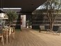 Patio with CDECK WUUDE Composite Deck in Natural Beech color