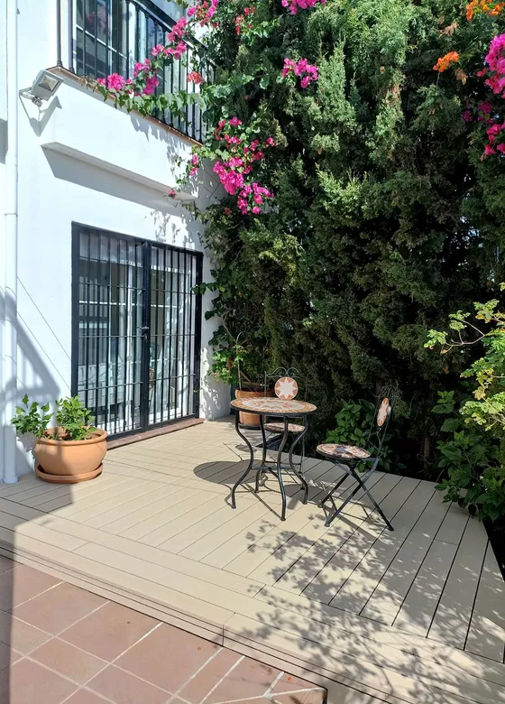 CDECK Original® composite decking in Beech Beige in a garden