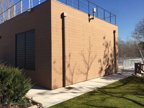 CWALL® composite façade cladding in Redwood on a building