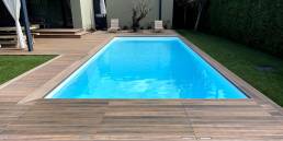 CDECK WUUDE composite decking in Soft Oak around a pool area