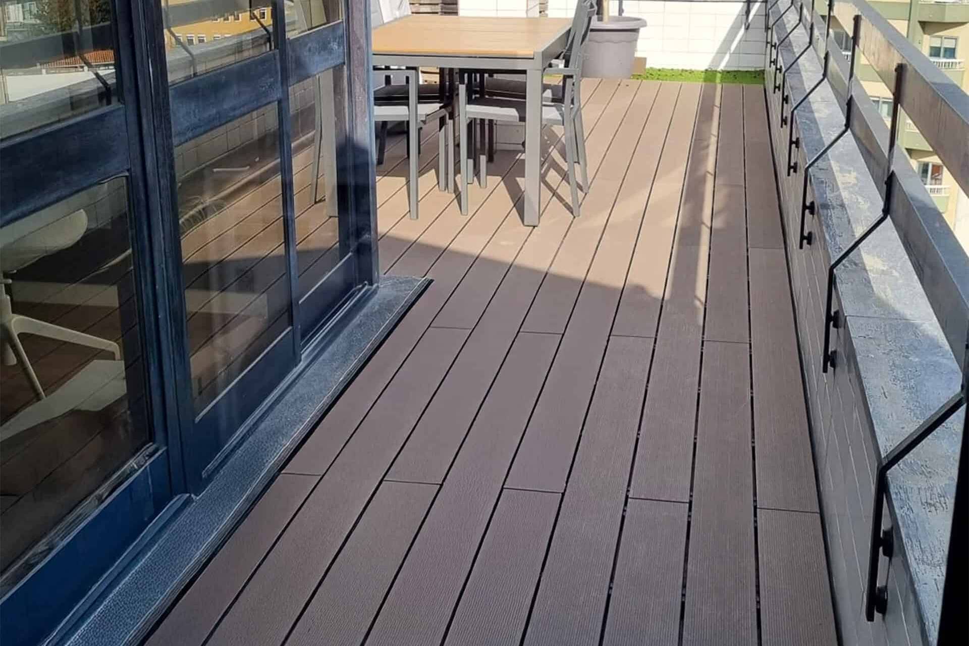 CDECK composite decking in redwood colour installed on a balcony