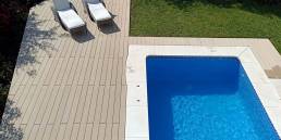 CDECK Original composite decking in beige beech colour in a pool area