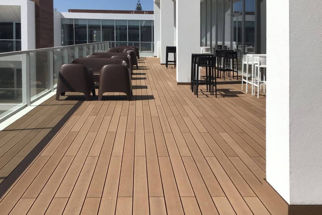 CDECK Original composite decking in Redwood on a commercial balcony