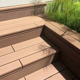 CDECK composite decking installed on a step in Redwood 