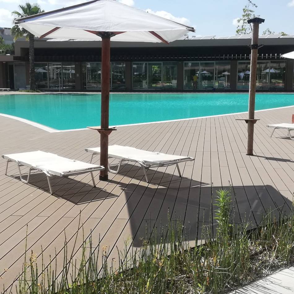 CDECK Composite Decking at the pool of Aqualuz Troia by The Editory