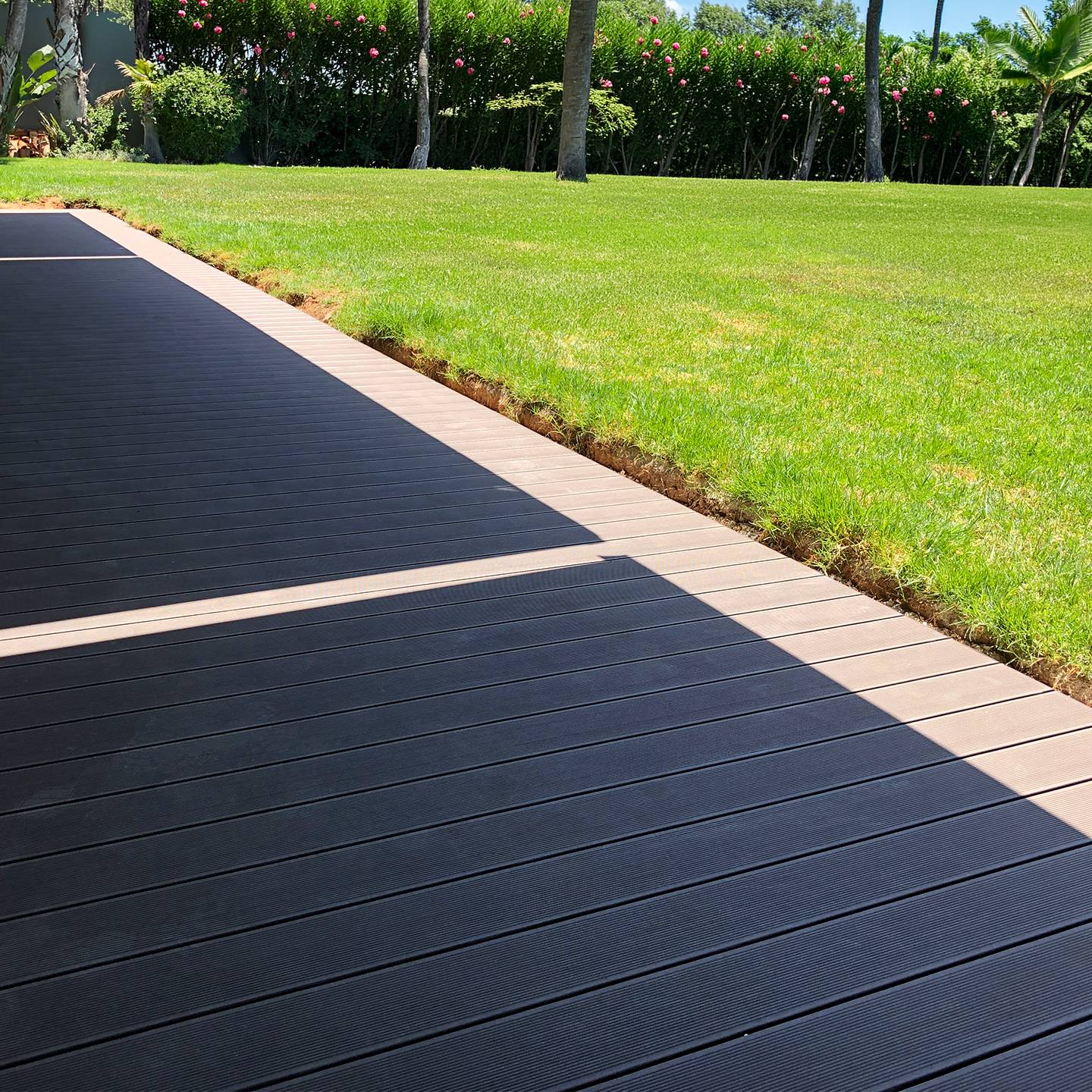 CDECK composite decking in Chocolate in a garden 