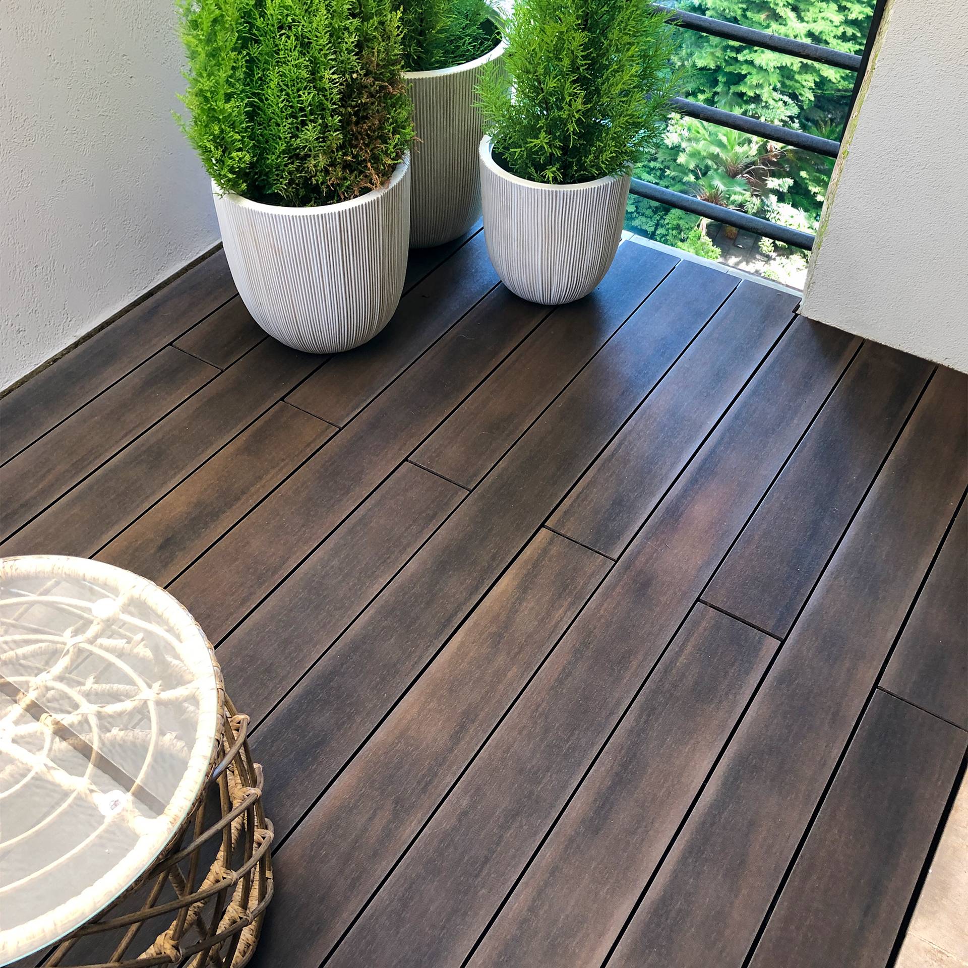 CDECK WUUDE composite decking in dark walnut colour on a balcony