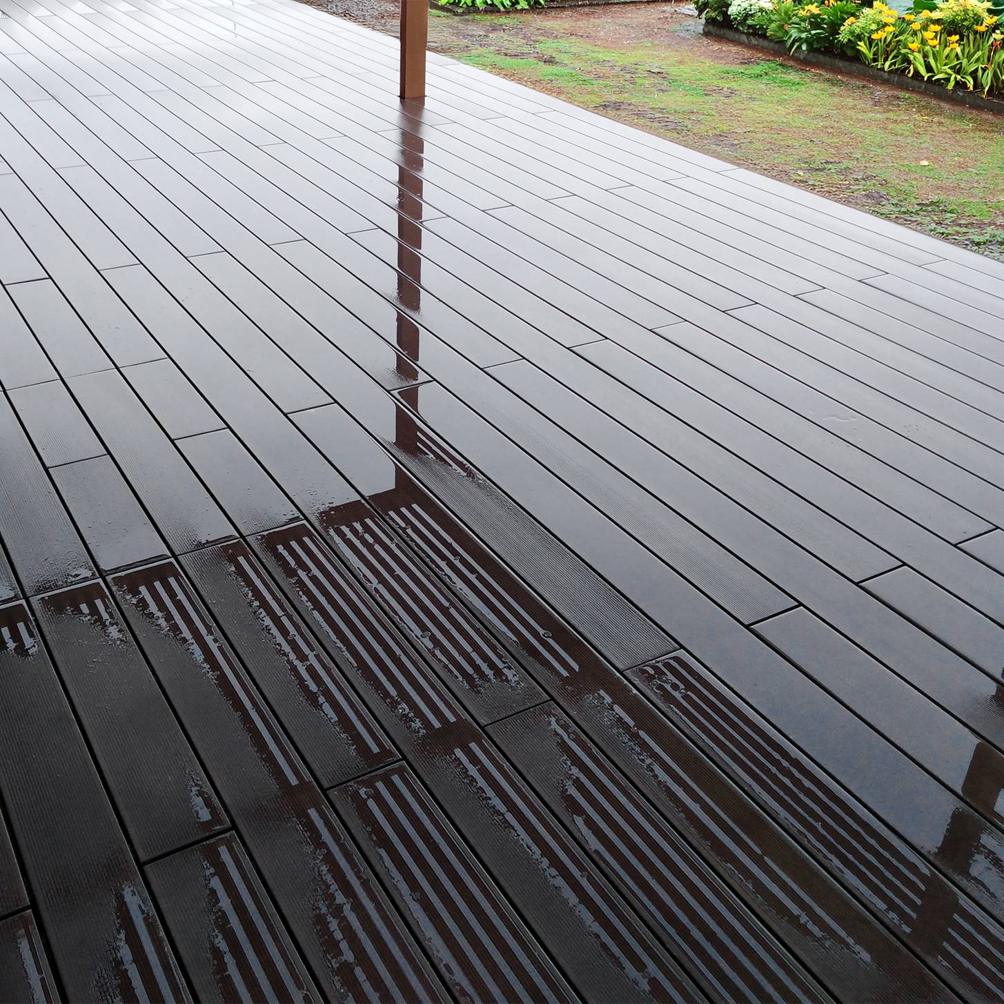 CDECK composite decking in Chocolate in a garden 