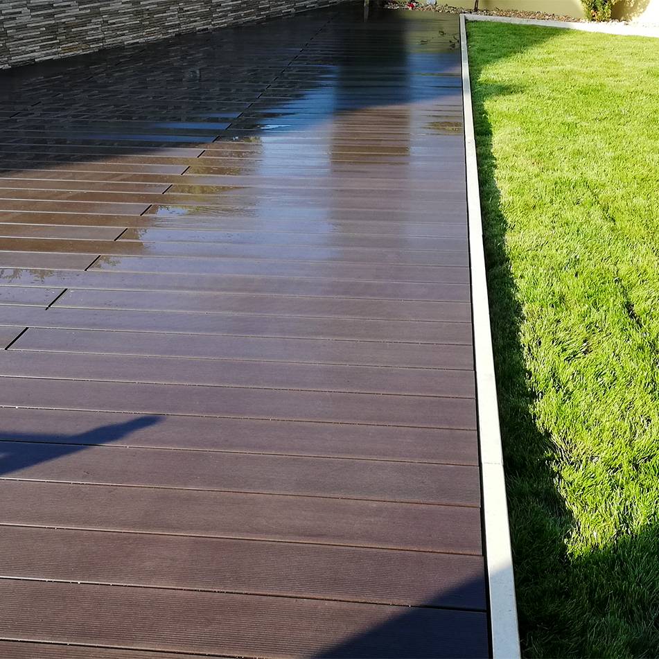 CDECK Original composite decking in chocolate colour in garden
