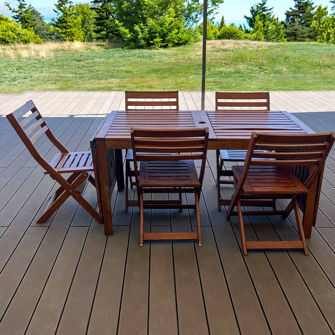 CDECK composite decking in Redwood in a garden