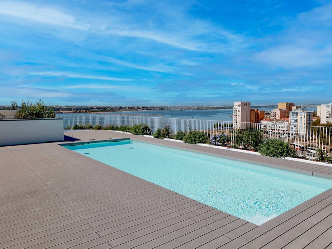 CDECK composite decking installed on a rooftop at Nooba (Setúbal)