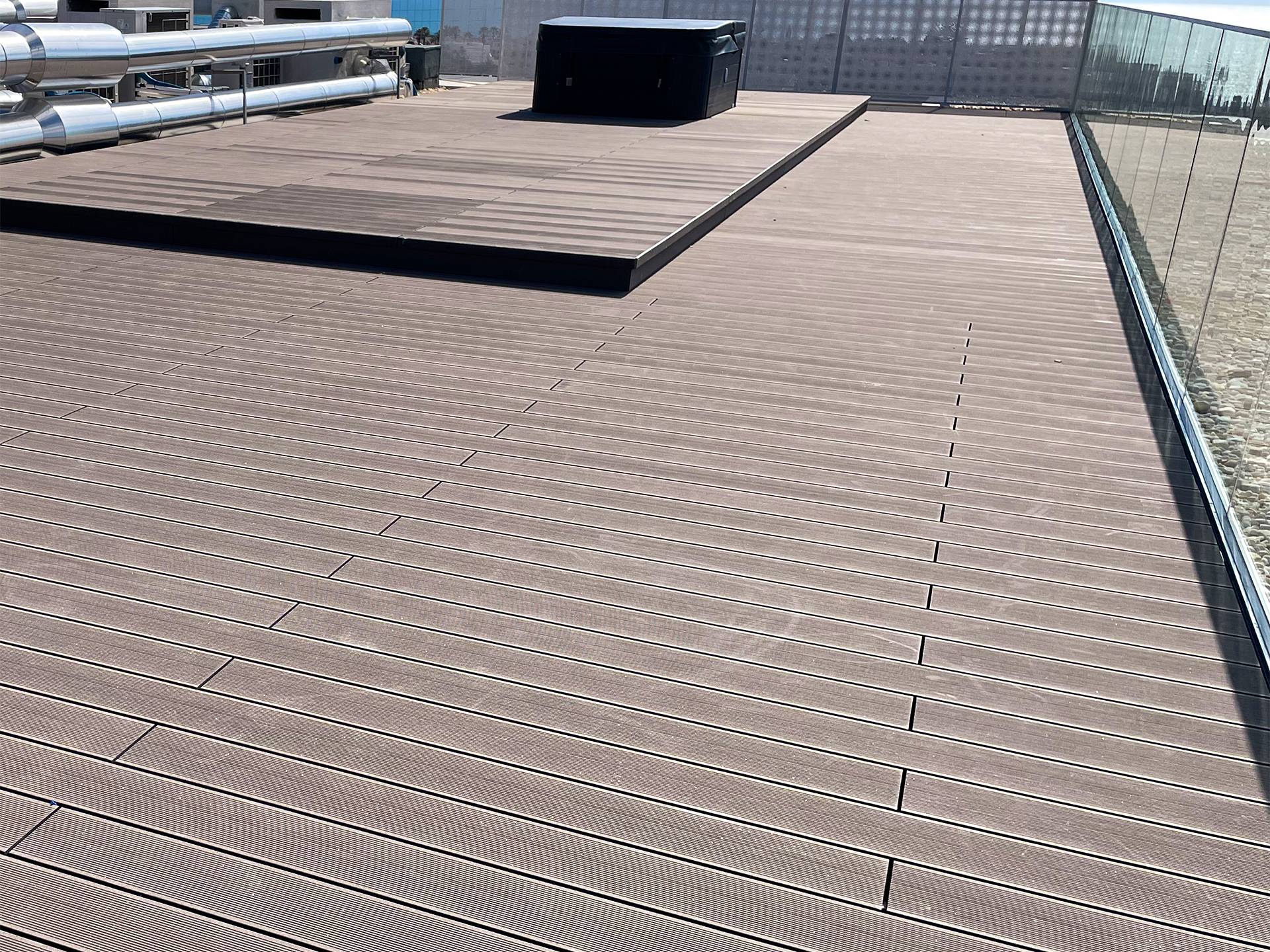 CDECK composite decking installed on a rooftop at Nomad Bay (Algarve)