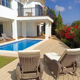 CDECK Original composite decking in beige beech colour in a pool area