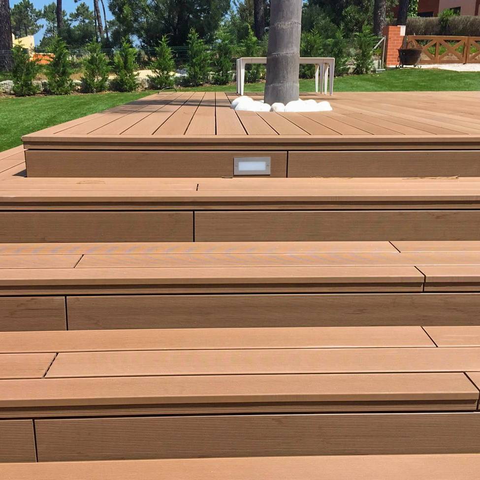 CDECK composite decking in Redwood installed in a garden