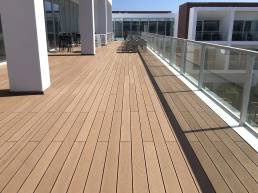 CDECK composite decking installed in the terrace and dining area at Iberostar Selection Lagos Algarve<br>