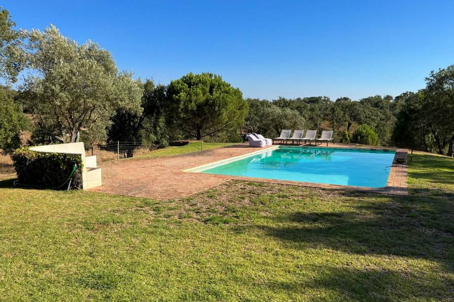 House in Santiago do Cacém with tile flooring in the pool area<br>
