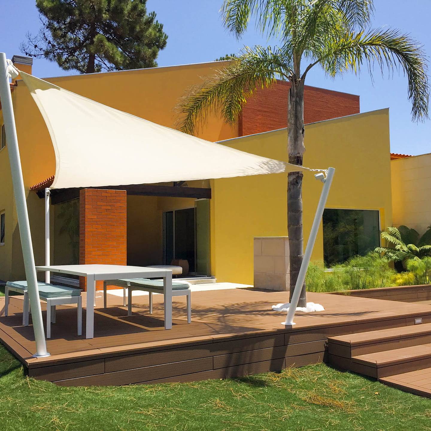 CDECK composite decking in Redwood installed in a garden