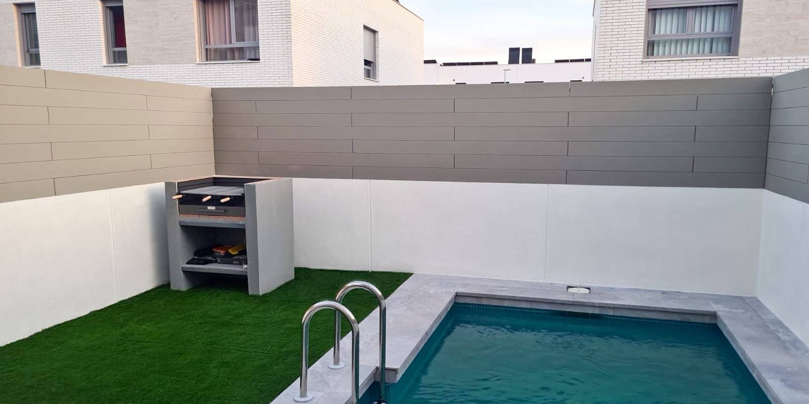 CWALL composite façade in grey color on a house in Madrid